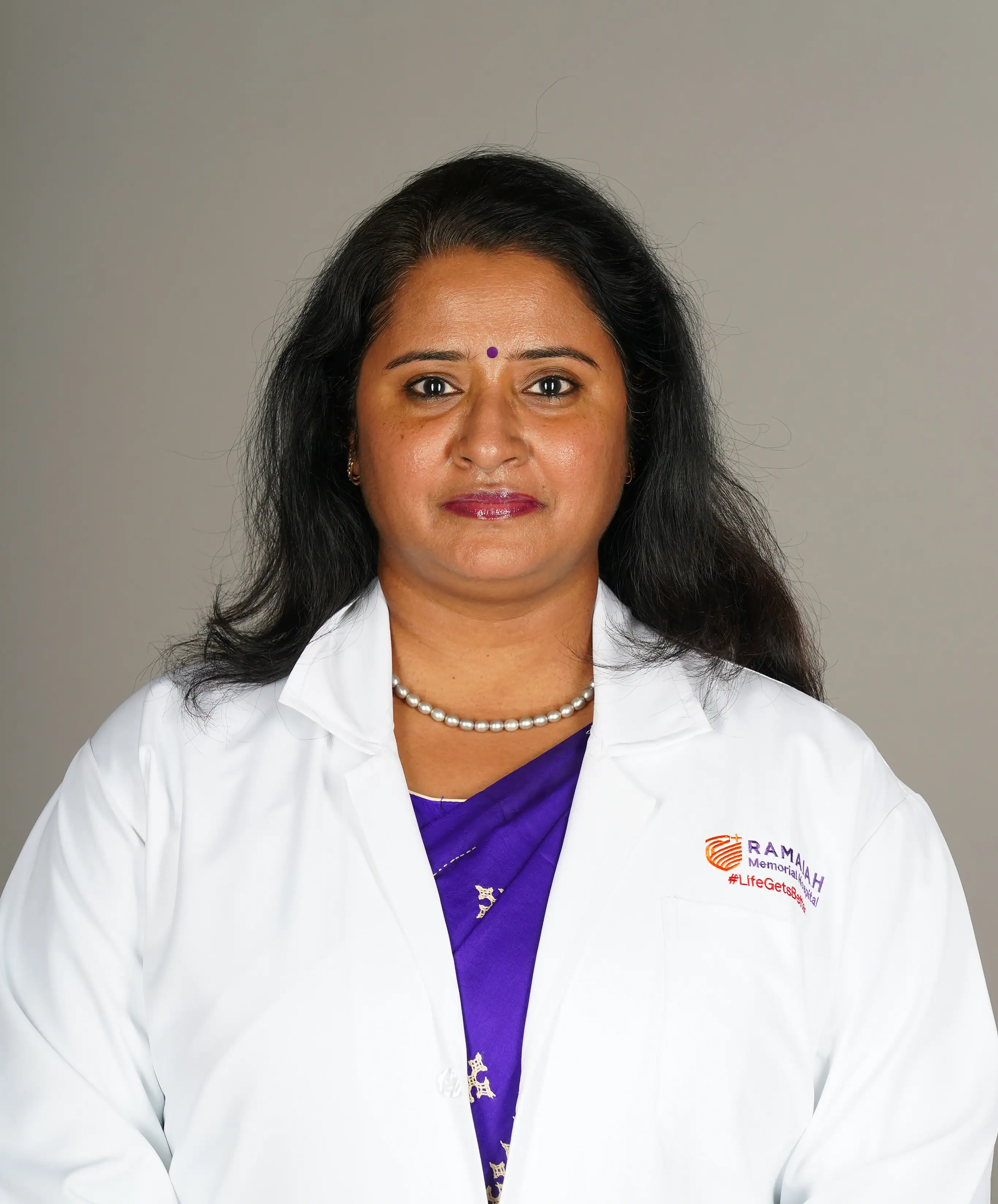 Dr. Chitra S
