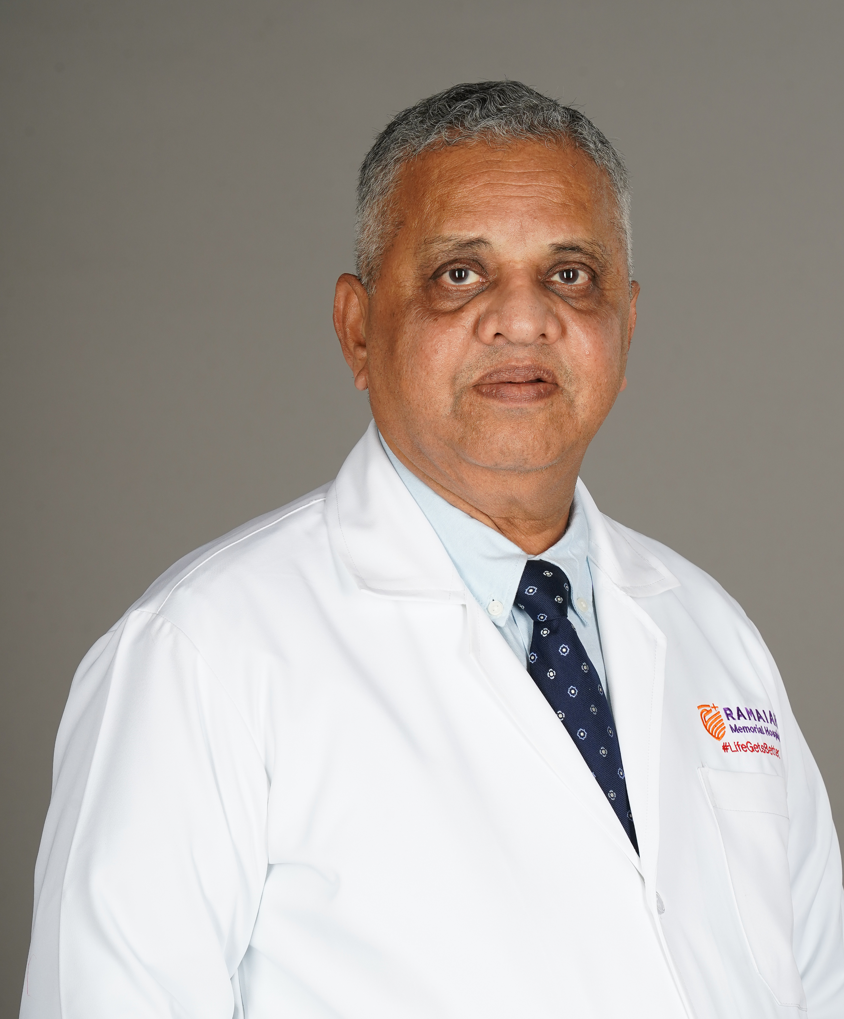 Dr. P T Acharya